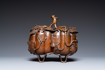 A Chinese bronze censer and cover in the shape of two pumpkins, 19th C.