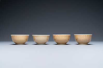 Thirteen Chinese famille rose saucers and twelve cups, Qianlong