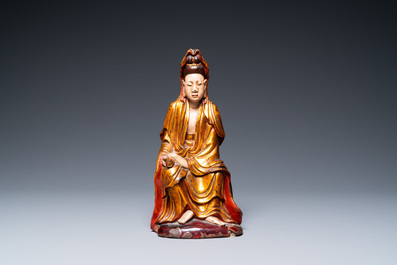 A Vietnamese gilded, lacquered and painted wooden figure of Guanyin, 18/19th C.