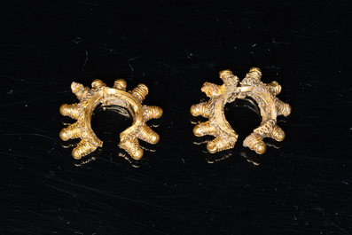 Three Vietnamese golden earrings, Champa, 14th C. and a pair of later Chinese gilded earrings, 18/19th C.