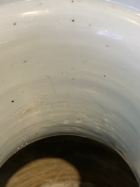 A Chinese blue and white rouleau vase with figures in a mountainous landscape, Kangxi