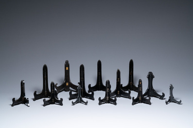 An extensive collection of Chinese wooden stands, 19/20th C.