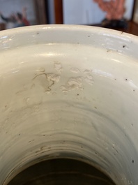 A Chinese blue and white rouleau vase with figures in a mountainous landscape, Kangxi