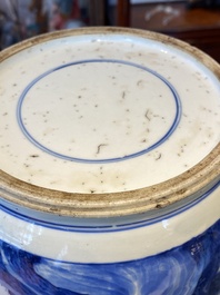 A Chinese blue and white rouleau vase with figures in a mountainous landscape, Kangxi