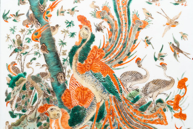 A Chinese famille verte plaque with a phoenix surrounded by other birds, 19th C.