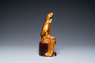 A Vietnamese gilded, lacquered and painted wooden figure of Guanyin, 18/19th C.