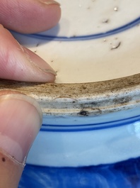 A Chinese blue and white rouleau vase with figures in a mountainous landscape, Kangxi