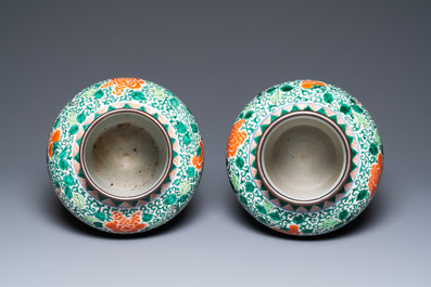 A pair of Chinese famille verte 'phoenix' vases, 19th C.