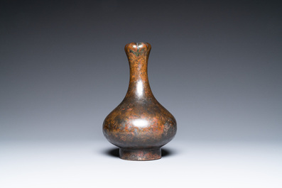 A Chinese bronze garlic-head 'hu' wine vessel, Eastern Zhou/Han