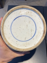 A Chinese blue and white rouleau vase with figures in a mountainous landscape, Kangxi