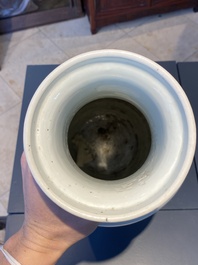 A Chinese blue and white rouleau vase with figures in a mountainous landscape, Kangxi