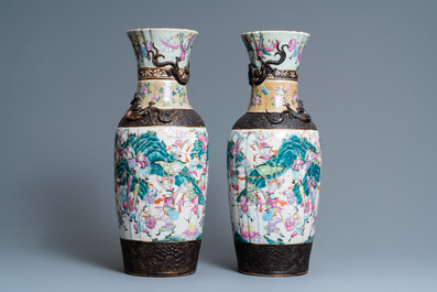 A pair of Chinese Nanking famille rose crackle-glazed vases, 19th C.