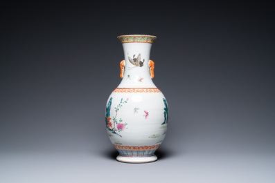 A Chinese famille rose 'deer carriage' vase, 19th C.