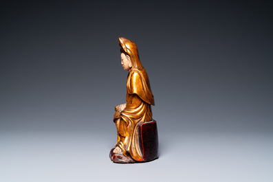 A Vietnamese gilded, lacquered and painted wooden figure of Guanyin, 18/19th C.