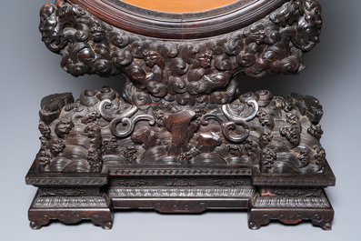 A pair of Chinese wooden table screens with soapstone- and bone-embellished medallions, 18/19th C.