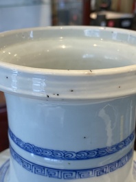 A Chinese blue and white rouleau vase with figures in a mountainous landscape, Kangxi