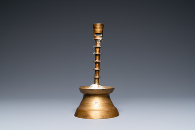 A Flemish or Dutch knotted bronze candlestick, 15th C.