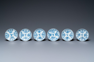 Six Chinese blue and white cups and saucers, six famille rose cups and five saucers, Kangxi/Qianlong
