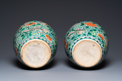 A pair of Chinese famille verte 'phoenix' vases, 19th C.