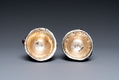 A pair of Chinese silver-lined coconut wine cups, Ming