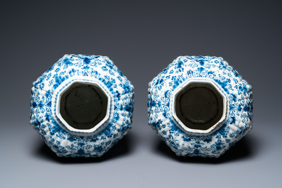 A pair of large ribbed Dutch Delft blue and white covered vases, 1st quarter 18th C.