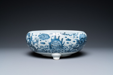 A Chinese blue and white tripod censer with dragons, Kangxi