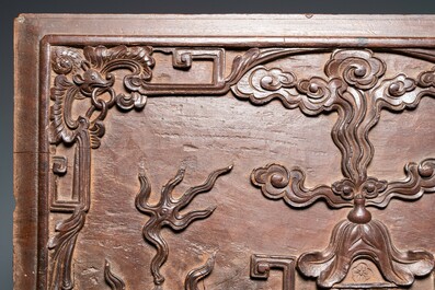 A Chinese carved wooden 'antiquities' panel, 19th C.