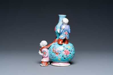 A Chinese famille rose double gourd vase with three boys, Qianlong