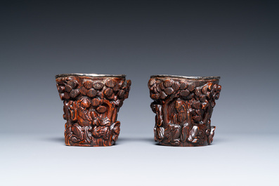 A pair of Chinese silver-lined coconut wine cups, Ming