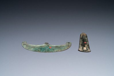 Two Luristan bronze axe heads, Iran, 1st millenium BC