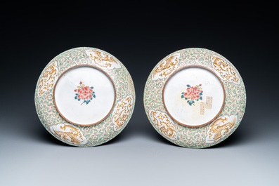 A pair of Chinese Canton enamel 'foreigner' plates, Qianlong