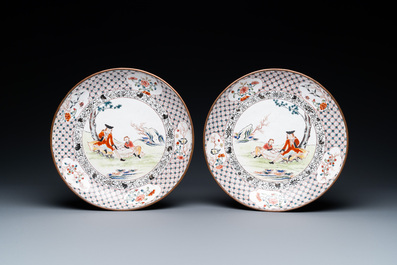 A pair of Chinese Canton enamel 'foreigner' plates, Qianlong