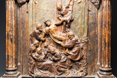 A large polychromed wooden and terra cotta 'Descent from the Cross' altar piece, Italy, 1st half 16th C.