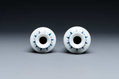 A pair of Chinese blue, white and copper-red miniature vases or snuff bottles, Qing Feng mark, 18/19th C.