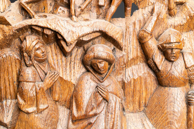 A Flemish carved oak retable fragment: 'Roman soldiers on mount Golgotha', ca. 1500