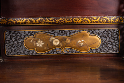 A Japanese 'chigaidansu' gilt-lacquered wood cabinet with finely carved ivory insets, Meiji, 19th C.
