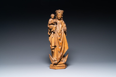 A large carved oak Madonna and child on a crescent moon, The Netherlands, probably Utrecht, last quarter 15th C.