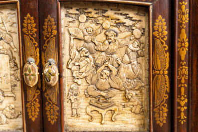 A Japanese 'chigaidansu' gilt-lacquered wood cabinet with finely carved ivory insets, Meiji, 19th C.