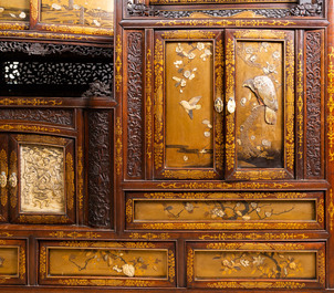 A Japanese 'chigaidansu' gilt-lacquered wood cabinet with finely carved ivory insets, Meiji, 19th C.