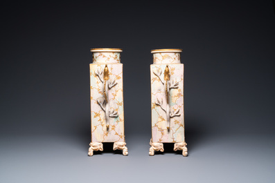 A pair of Japanese Satsuma 'Shimazu Mon' vases on elephant feet, Meiji, 19th C.
