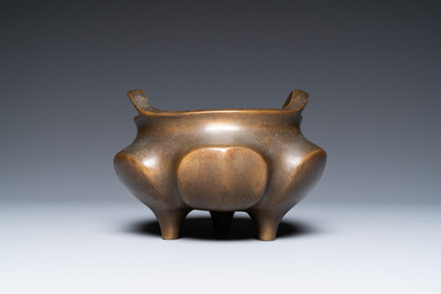 A Chinese bronze censer on lotus stand, Xuande mark, 19th C.