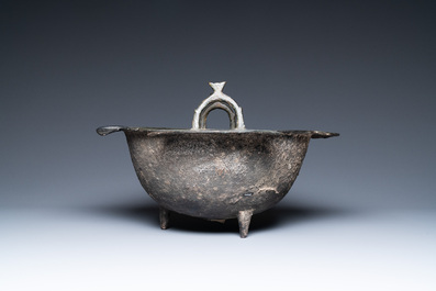 A Persian bronze tripod cauldron, Khorasan, Iran, 12/13th C.