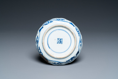 A Chinese blue and white shonzui ko-sometsuke dish with birds and calligraphy for the Japanese market, Chongzhen