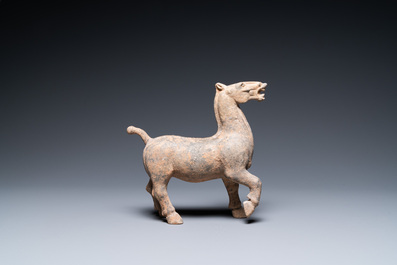 A Chinese pottery model of a horse, Han