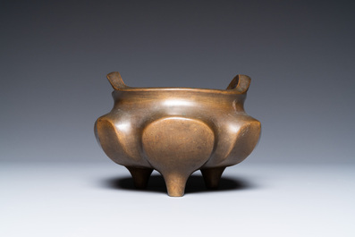 A Chinese bronze censer on lotus stand, Xuande mark, 19th C.