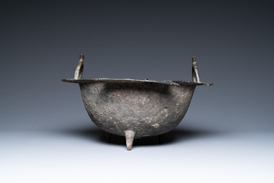 A Persian bronze tripod cauldron, Khorasan, Iran, 12/13th C.