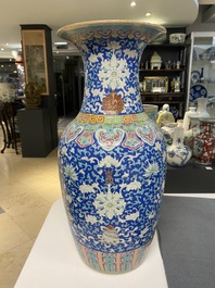 A Chinese famille rose blue-ground 'bajixiang' vase, 19th C.