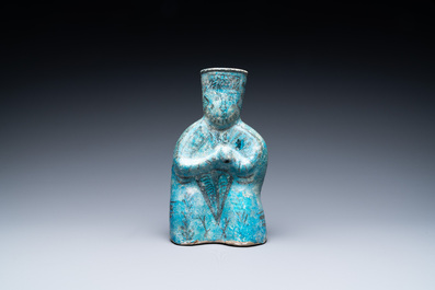 A turquoise- and black-glazed pottery figurative ewer, Kashan, Iran, 12/13th C.