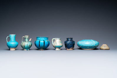 Une collection de sept vases et verseuses en c&eacute;ramique &agrave; &eacute;mail turquoise, Moyen-Orient, 13&egrave;me et apr&egrave;s