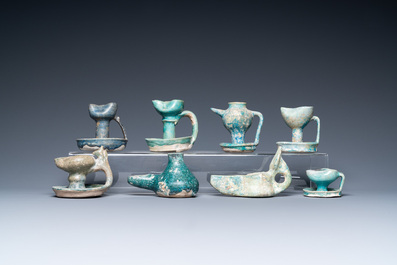 Eight turquoise-glazed oil lamps, Middle-East, 13th C. and later